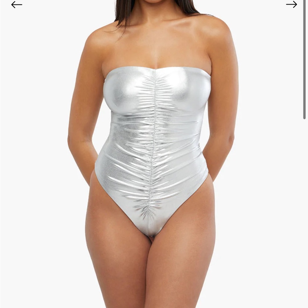 We wore what silver one piece swim